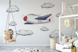 samolot w chmurach - fototapeta dla dzieci